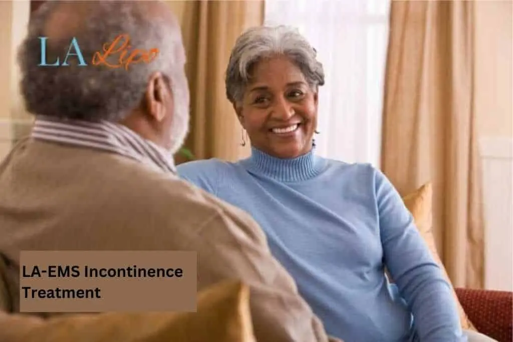Couple sat smiling at each other - LA-EMS treatment Havant